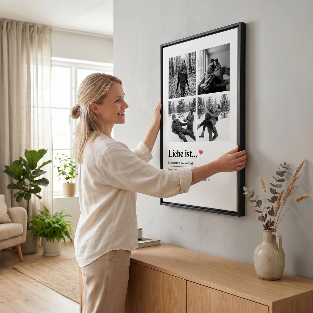 Frau hängt Leinwand auf 23 black
