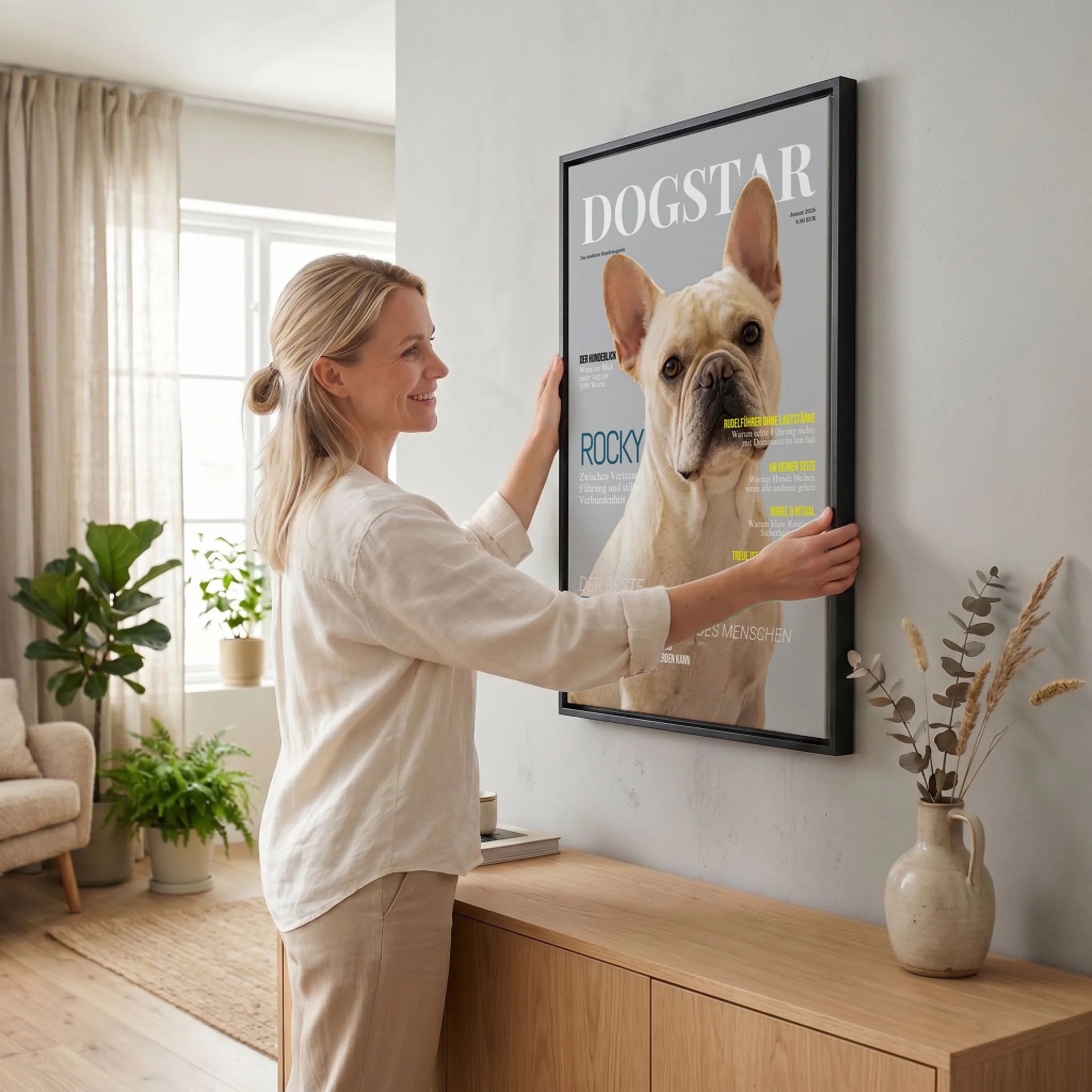 Frau hängt Leinwand auf 23 black