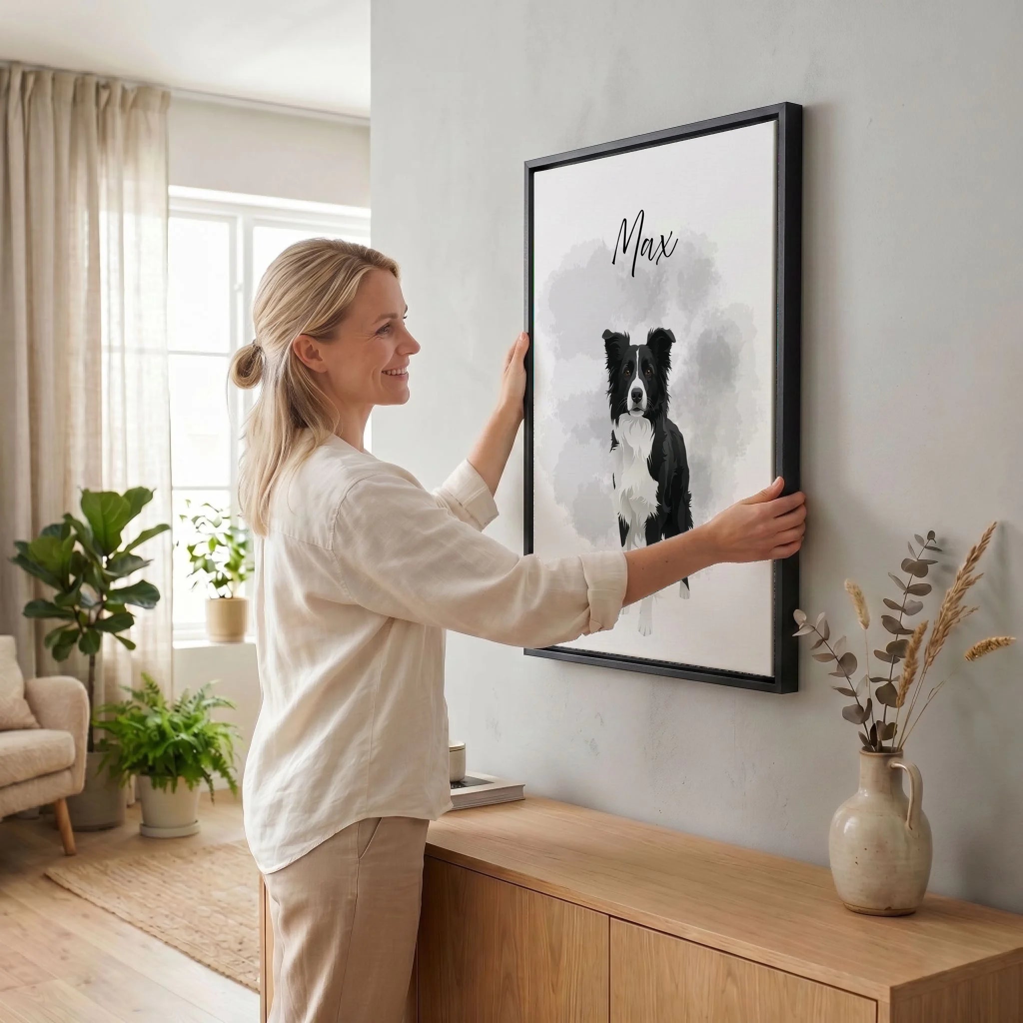 Frau hängt Leinwand auf 34 black