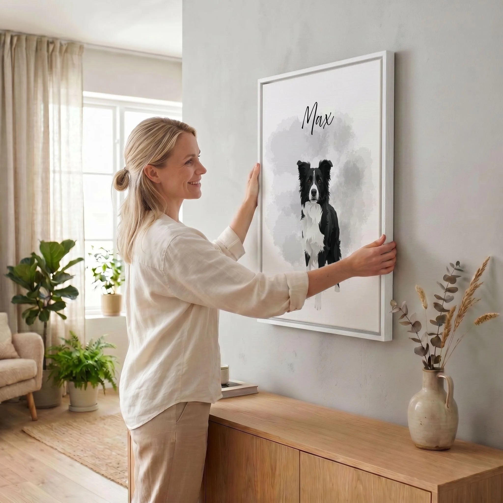 Frau hängt Leinwand auf 34 weiss