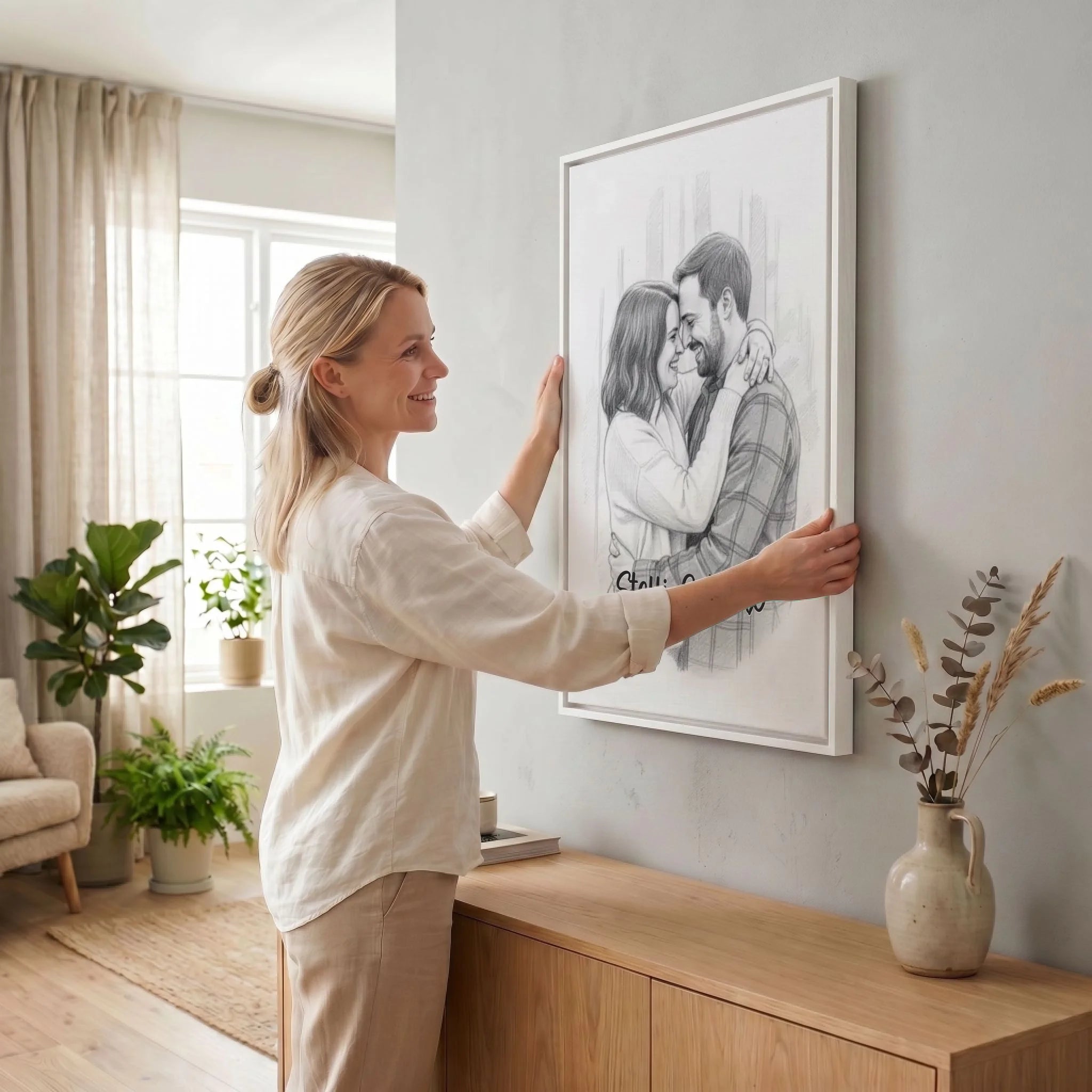 Frau hängt Leinwand auf 23 weiss