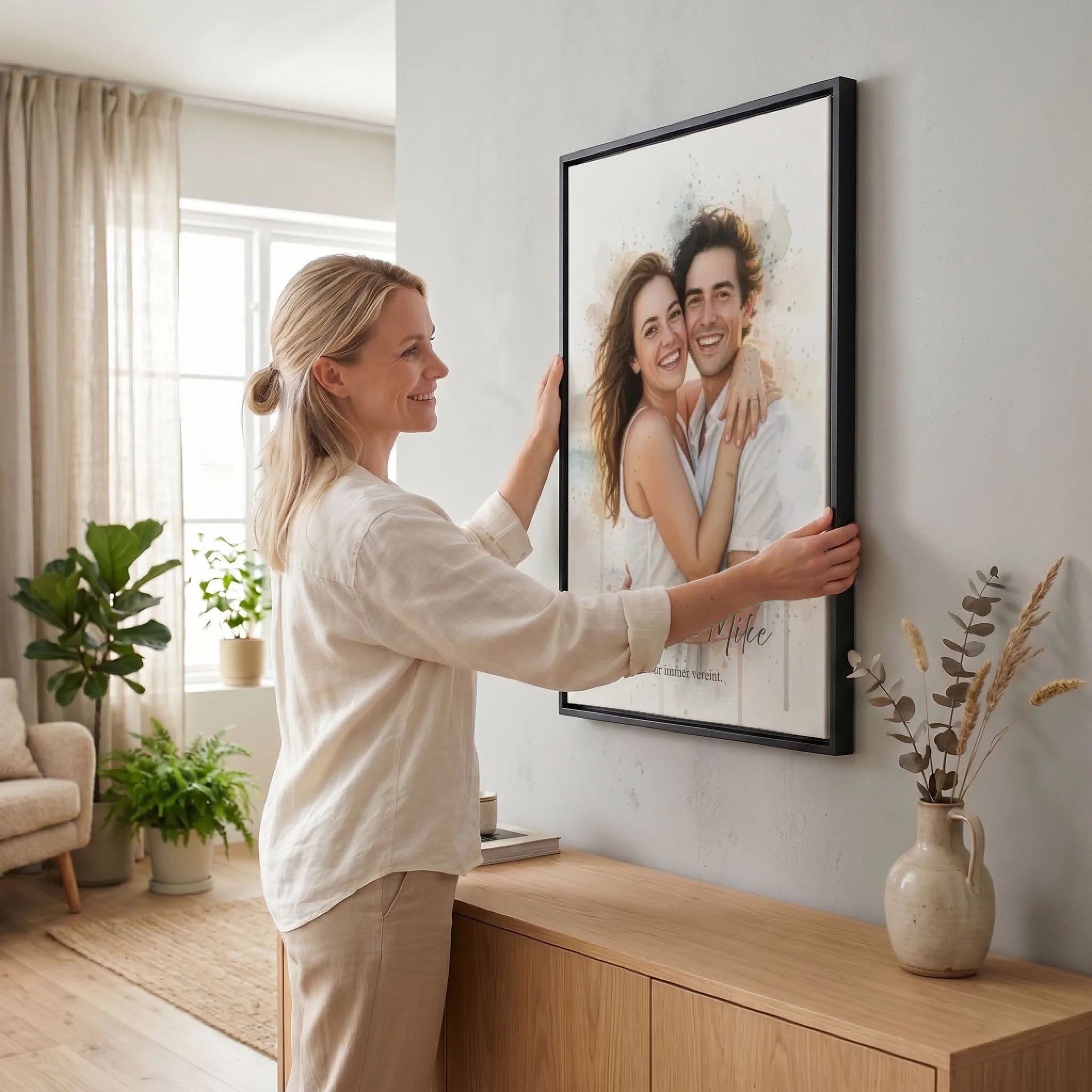 Frau hängt Leinwand auf 23 black
