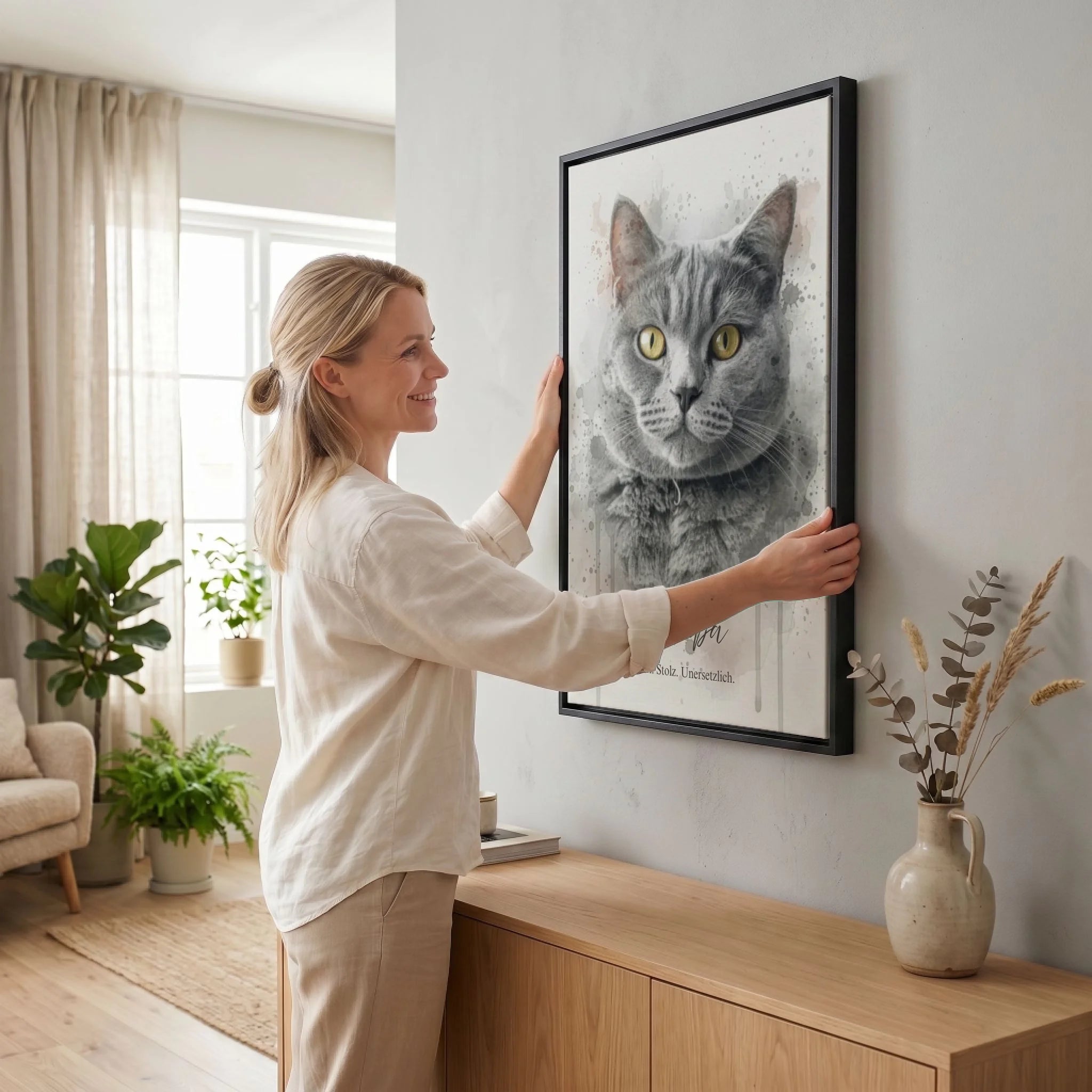 Frau hängt Leinwand auf 23 black