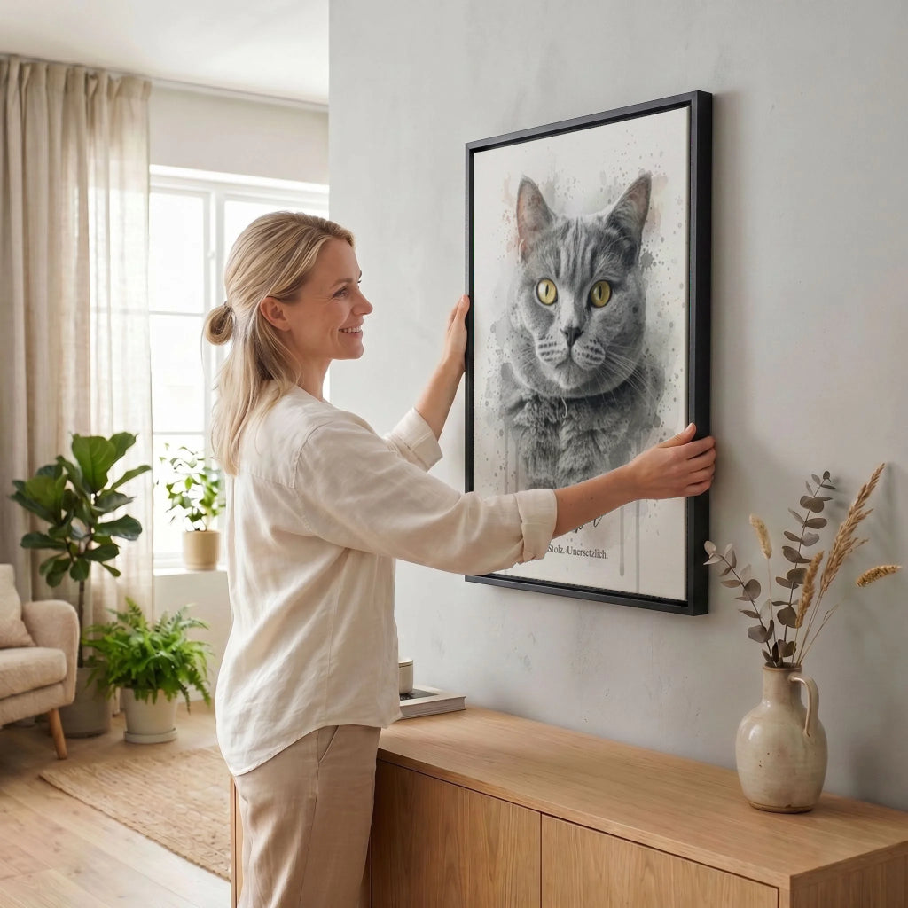 Frau hängt Leinwand auf 34 black