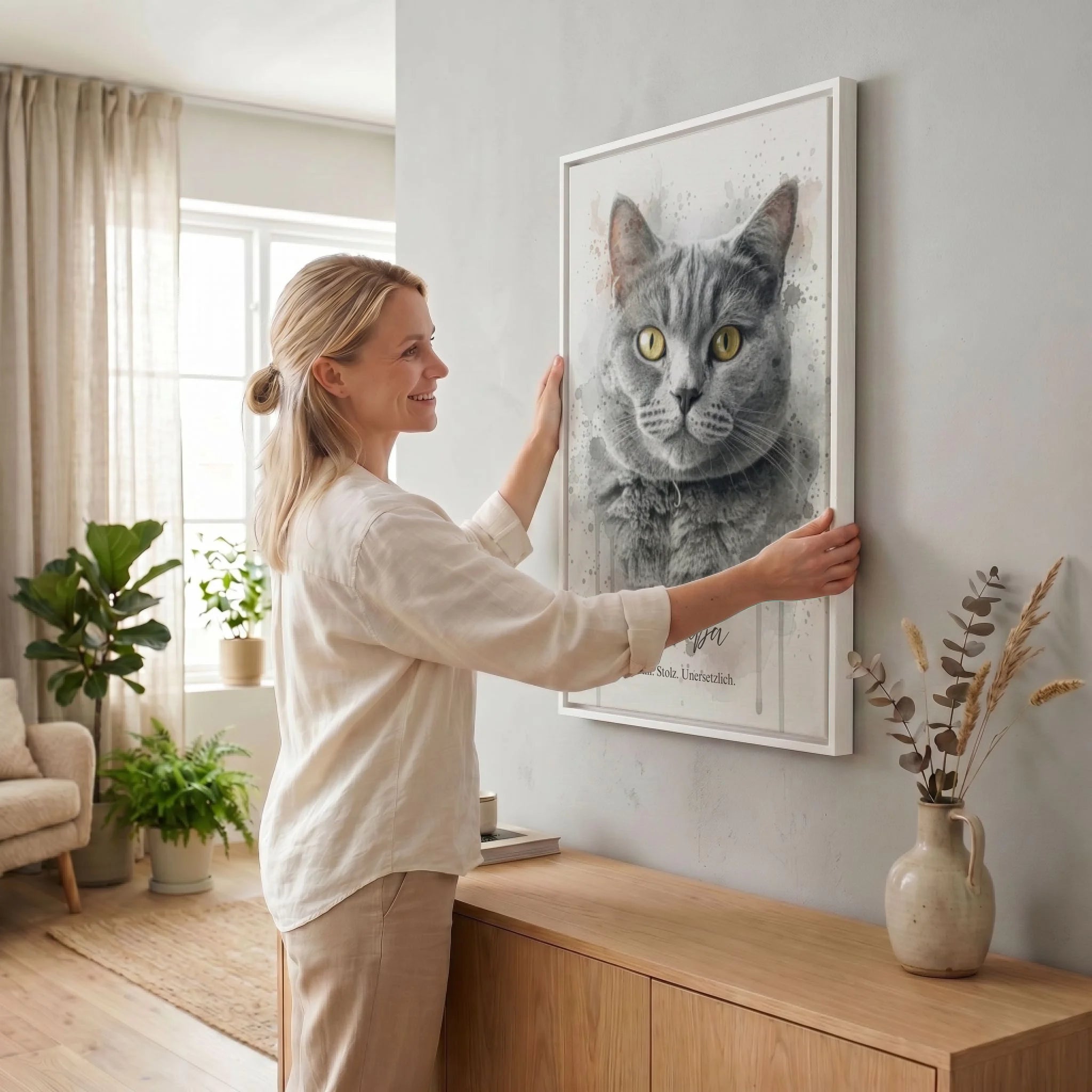 Frau hängt Leinwand auf 23 weiss